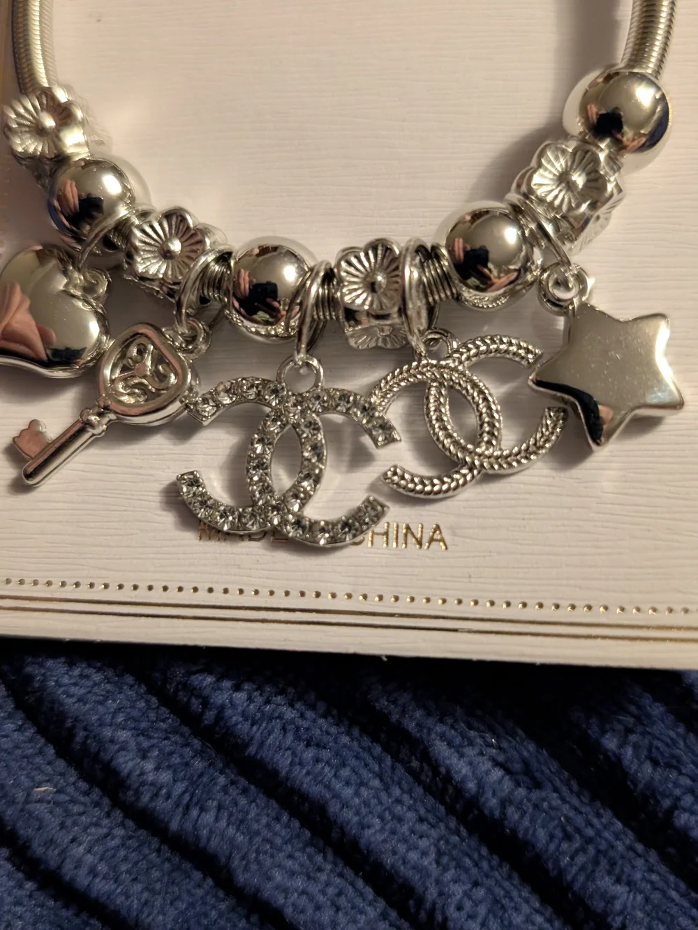 Silver Charm Bracelet with Interlocking Logo Accent